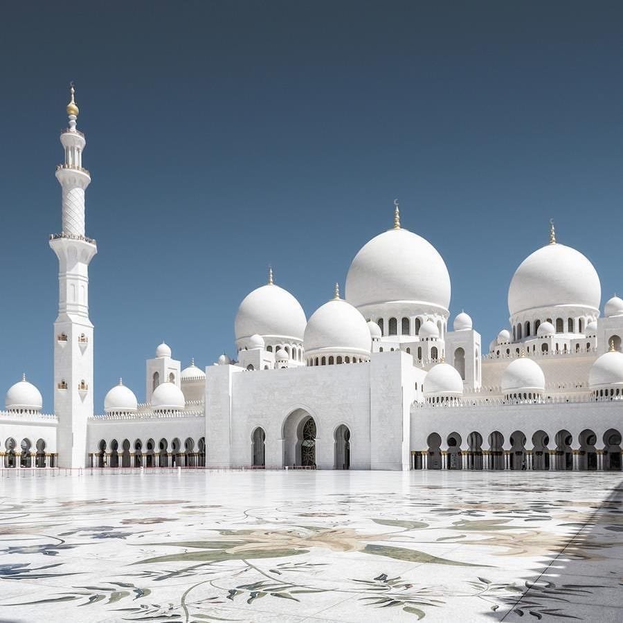 White domes of the Sheikh Zayed Grand Mosque.